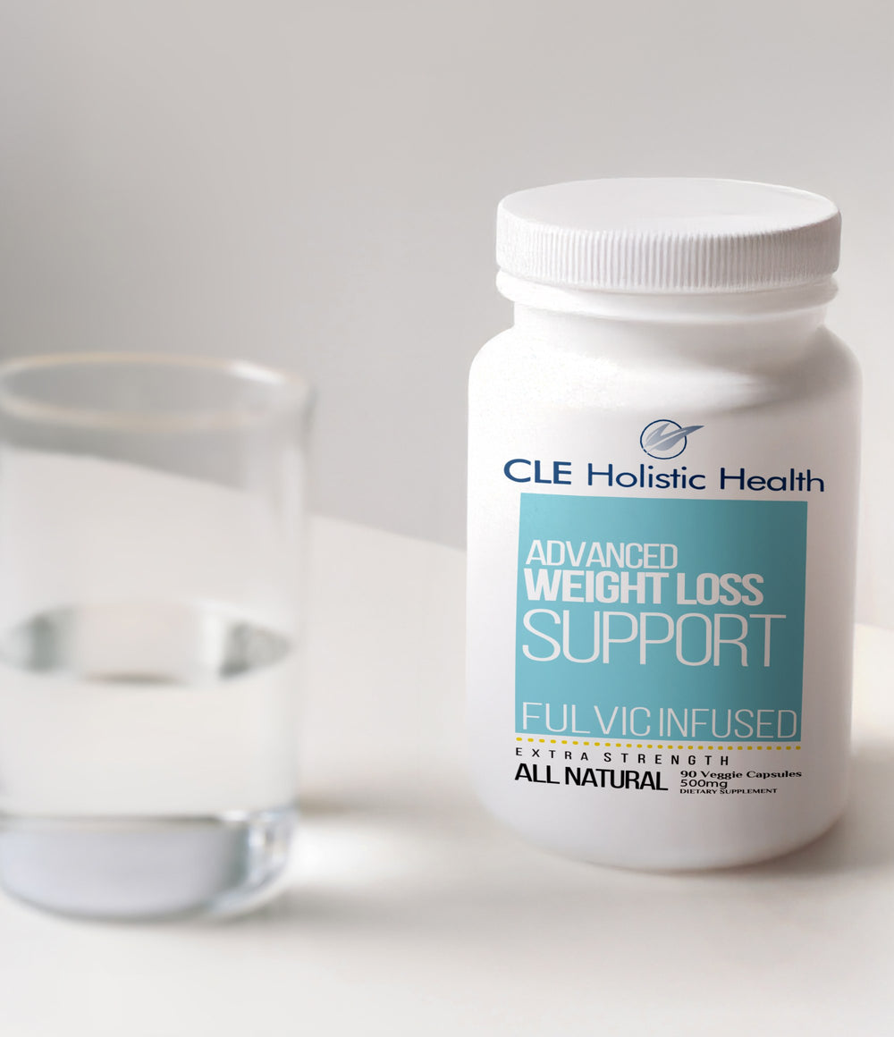 SlimQuest weight management support bottle beside a glass of water